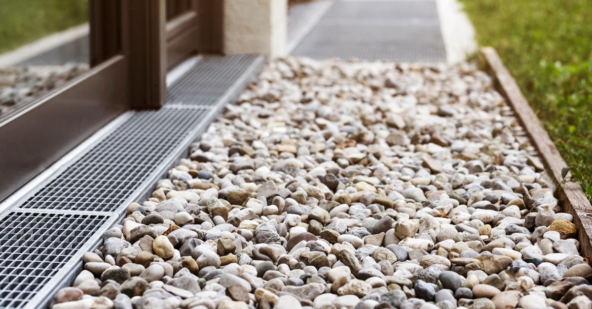 Why River Rock and Pea Gravel Are Top Choices for French Drains